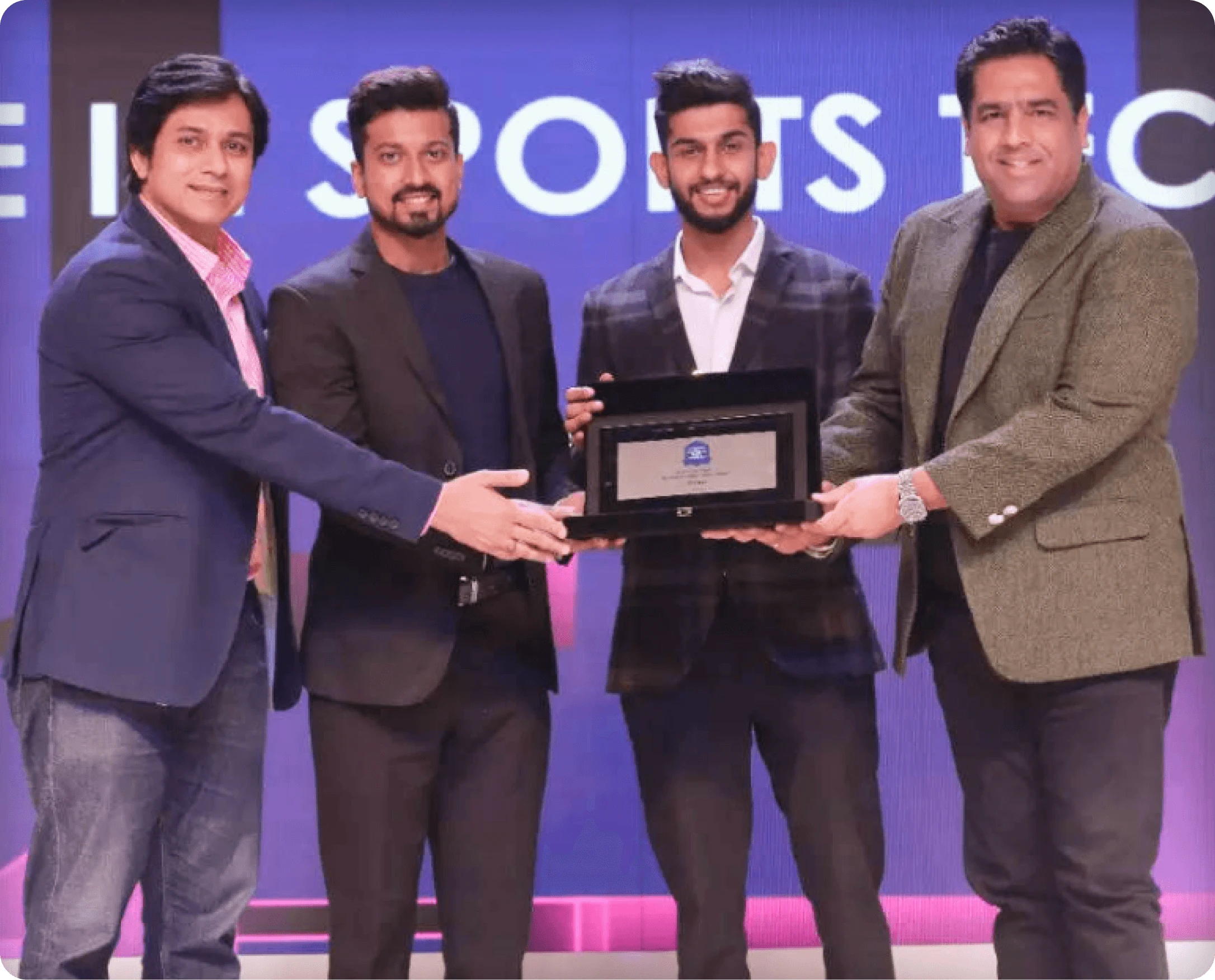 The MagicMond team receiving an award